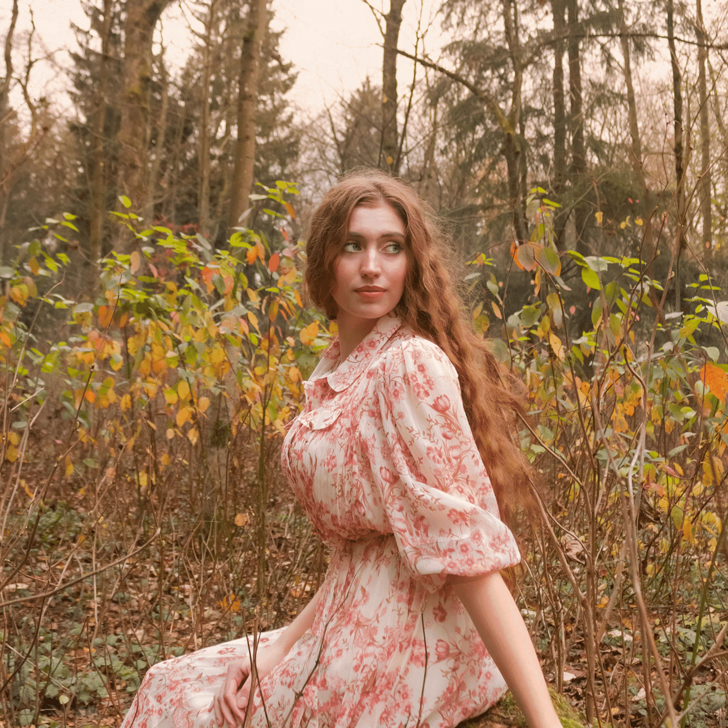 Portrait of Kiara, a professional stylist at Ivy & Vine Beauty Haven, showcasing their expertise and style.